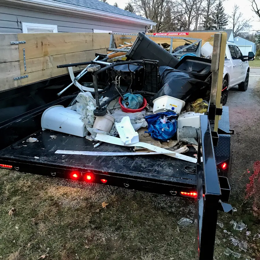 Roll-off dumpster delivered to a residential driveway in Wright