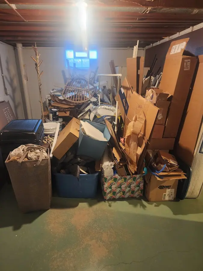 Roll-off dumpster container at job site for 15 Yard Dumpster Rental in Wright